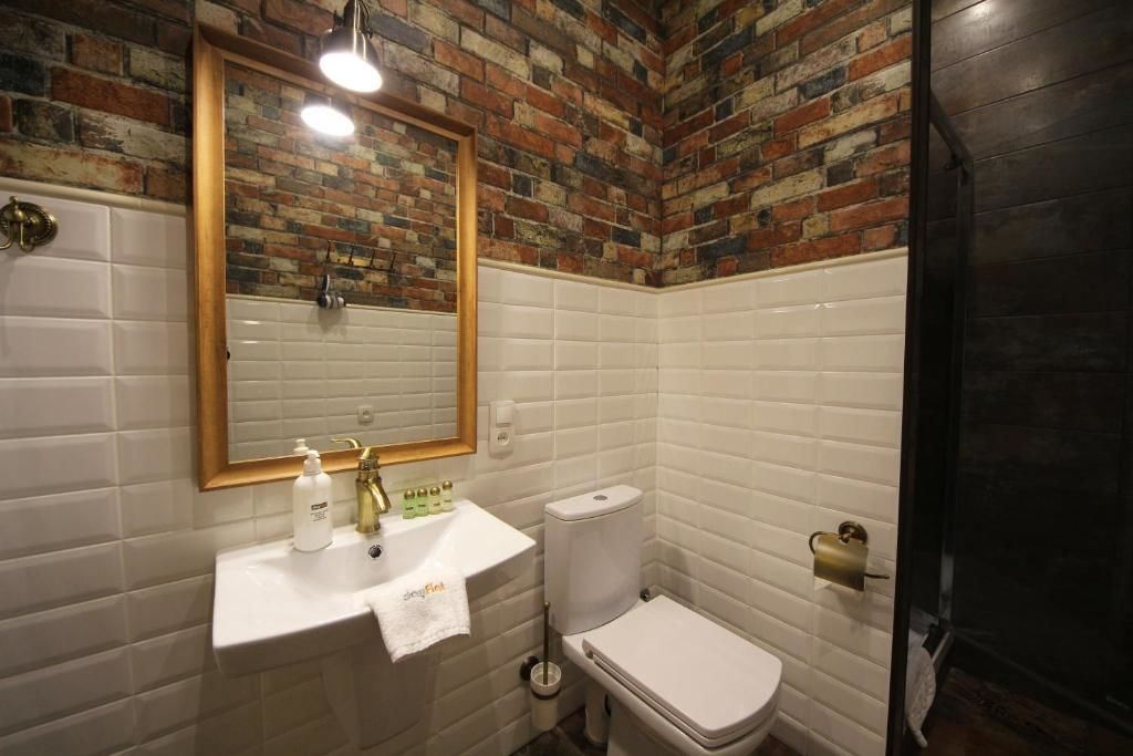 Апартаменты Loft Apartments on Desyatynnyi Ln Киев-29