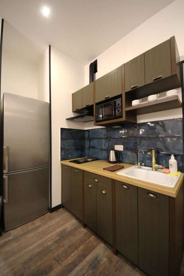 Апартаменты Loft Apartments on Desyatynnyi Ln Киев-9